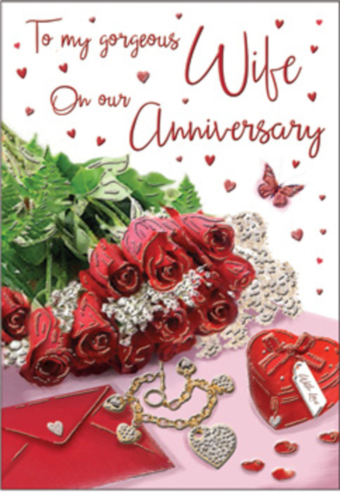 This richly emotive anniversary card design presents a classic bouquet of red roses as the focal point, laid out with the care of a seasoned Virginia Water florist. Each rose is fully open and luxuriously layered, the petals forming deep spirals of velvety crimson that stand out dramatically against the soft, neutral surroundings. Intertwined with the blooms is lush, vibrant greenery, which amplifies the sense of natural abundance, as if the flowers were freshly gathered from a garden not far from the tranquil paths around Virginia Water Lake. The bouquet appears elegantly wrapped, the smooth material catching the light in subtle folds that recall silk or fine ribbon. Nestled nearby, a jewellery set, perhaps a delicate necklace and matching earrings, glimmers with restrained elegance, suggesting a treasured anniversary gift. A vivid red box anchors the ensemble, its bold colour echoing the roses and hinting at something precious tucked inside. Light lace-like patterns and scattered heart motifs add softness and visual interest, guiding the viewer's gaze gently around the image. A scripted message sweeps gracefully across the card, reinforcing the tone of heartfelt romance without overpowering the visual elements. Textures mingle-soft petals, metallic shine, crisp paper, and whisper-thin decorative accents-to evoke the warmth of an affectionate embrace. The overall impression is one of timeless, refined romance, the sort of thoughtful presentation you might find in a carefully curated anniversary display inside a Virginia Water home, where every year together is honoured with meaningful gifts, shared glances, and quiet moments of gratitude.