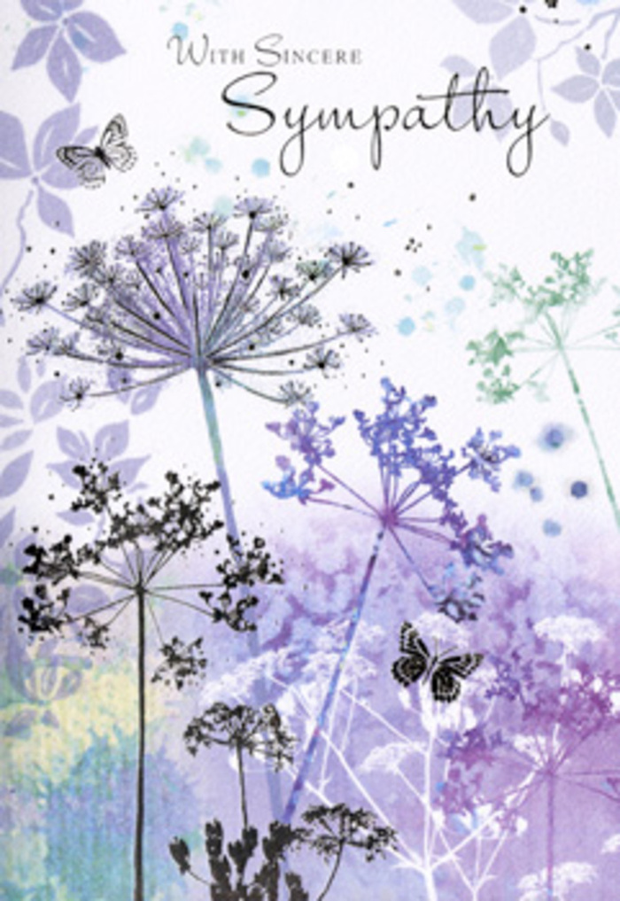 This sympathy card, often chosen by families around Virginia Water, presents a tranquil floral landscape that feels at once intimate and expansive, like an unhurried walk through Windsor Great Park. At the forefront, tall, fine stems emerge from a soft, indistinct base, each one bearing an umbel of tiny flowers painted in layered shades of lavender, powder blue, and muted indigo. The flower heads have a filigree quality, their many minute blossoms hinted at with light, tapering strokes that give them a sense of airy volume rather than hard detail. Behind them, the background dissolves into velvety washes of violet and silvery green, the colours fusing together as if seen through an early morning haze over Virginia Water Lake. Two or three butterflies float above and among the blooms, their attenuated wings blending into the surrounding hues, offering a refined suggestion of transformation, hope, and continuing presence. The lighting feels naturally diffused, with no harsh contrasts, as though the scene were lit by a softly overcast sky. Every element works in harmony to convey calm, reflection, and a compassionate understanding of grief. It is easy to picture this card propped beside a vase of sympathy flowers delivered to a home near Callow Hill or Stroude Road, its artwork catching a slant of daylight and quietly reassuring the bereaved that they are held in kind thoughts. The design is neither ornate nor stark; it occupies that tender middle ground where nature's gentlest shapes and tones provide solace without demanding attention, making it a considerate choice when words alone don't feel sufficient.