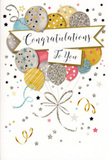 The photograph shows a sophisticated congratulations card that radiates quiet celebration, much like an intimate gathering in a Virginia Water home. Central to the design is a lush, upward-reaching cluster of illustrated balloons, their rounded shapes overlapping in a natural, bouquet-like formation. The balloons display a refined colour scheme of gold, silver, champagne, blush pink, sky blue, and soft grey, each one decorated with subtle metallic details-tiny stars, slim bands, and fine glitter-like speckles that add a gentle sparkle reminiscent of early evening light over Virginia Water Lake. From the base of each balloon, slim ribbons flow downward in glimmering gold and silver ink, looping and curling together at the bottom with the effortless grace of a ribbon wrapped around a gift or floral arrangement. The pale background is softly sprinkled with miniature stars, swirling ribbons, and confetti dots, giving a sense of motion, as if the celebration were unfolding in real time. Cutting gracefully across the centre of the card is a banner bearing the message Congratulations To You in elegant, handwritten-style calligraphy that feels both warm and sophisticated. The overall effect is soothing yet festive, perfect for marking milestones such as a promotion, exam results, or a new chapter in life in and around Virginia Water. With its balance of pastel tones and metallic accents, this card would sit beautifully alongside a fresh bouquet, offering a visual expression of admiration, pride, and shared happiness.