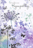 This Virginia Water condolence card feels like a gentle visual poem inspired by the lakeside paths and soft woodland edges nearby. Across the front, slender stems of wild, umbelliferous flowers stretch upward with a graceful, reaching motion, their fine lines rendered in subdued greens that melt into the misty background. At each tip, clusters of miniature blossoms form delicate umbels painted in layers of lavender, indigo, and soft blue, creating an impression of lace held lightly against the sky. The backdrop is a dreamy blend of watercolour washes, where muted purples, blue-greys, and hints of sage green flow into one another, echoing the calming tones of Virginia Water Lake under a gentle, clouded sky. Wisps of foliage and faint silhouettes sit just behind the flowers, enhancing the sense of depth without crowding the eye. Here and there, a few butterflies hover with wings that appear almost see-through, outlined in the softest of greys and lilacs, suggesting transformation and the unseen presence of those we miss. The overall effect is cool yet comforting, offering a quiet refuge for the viewer's thoughts. The simple sympathy wording rests above the blooms in an elegant script, harmonising with the artwork rather than competing with it. As someone used to helping local families choose the right card to accompany condolence flowers delivered across Virginia Water and its surrounding lanes, I recognise in this design a respectful embrace: understated, sincere, and steeped in nature's own language of remembrance and enduring care.